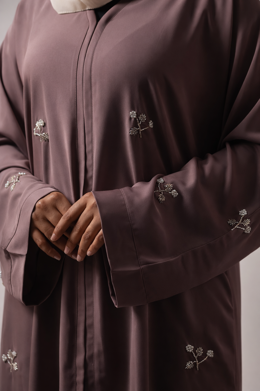 Full-length premium abaya with detailed handwork and graceful modest style