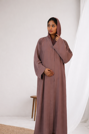 Elegant plain peach abaya with clean minimalist design for modest everyday wear