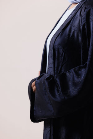 Long open-front abaya shrug with elegant jacquard pattern for layering outfits