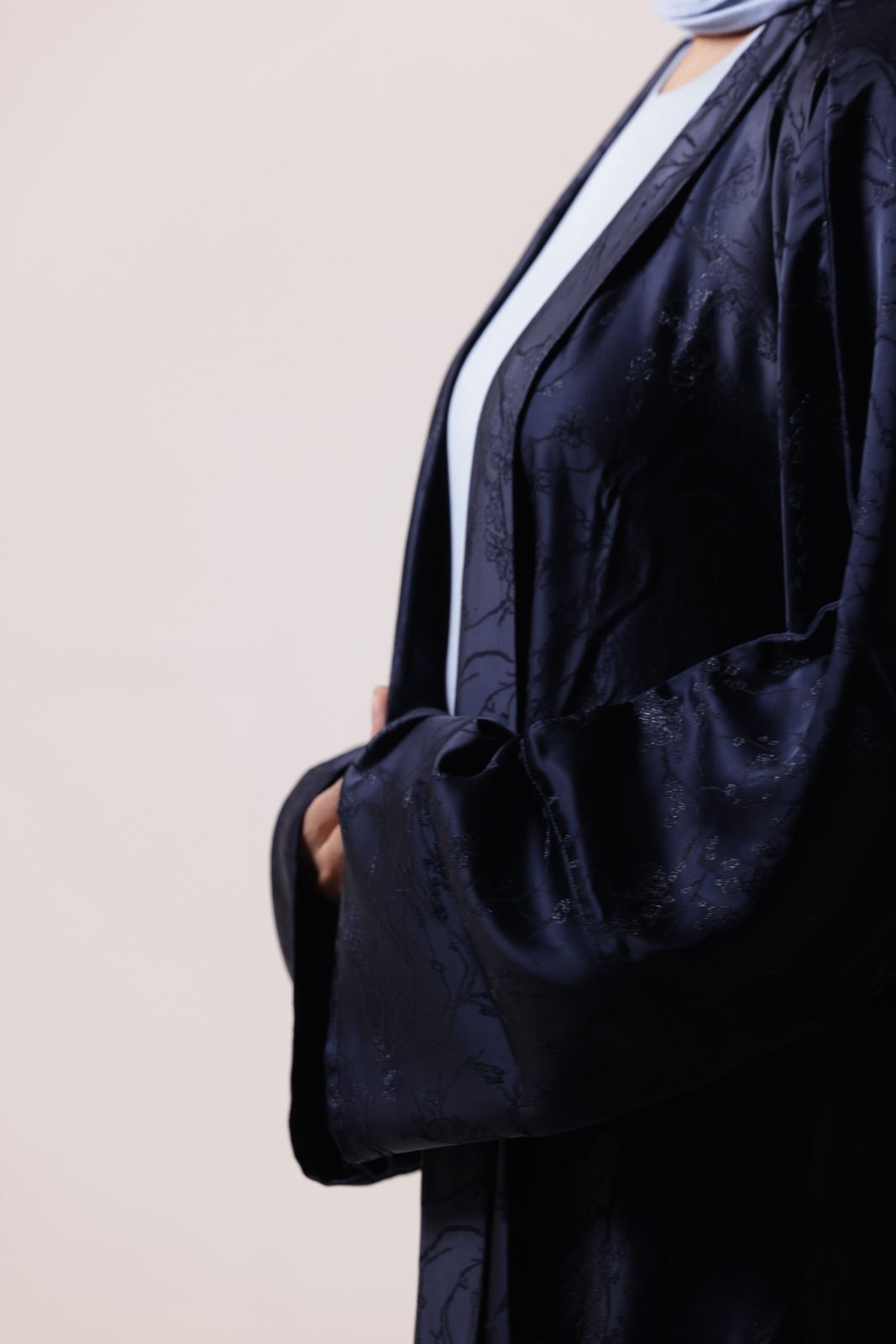 Long open-front abaya shrug with elegant jacquard pattern for layering outfits