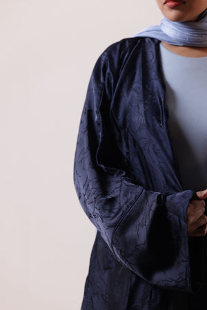 Modest fashion shrug abaya with woven jacquard texture and wide sleeves
